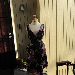 #608  WOMAN''S BLACK FLORAL DRESS BY COLLECTION  (SIZE 16US / 20UK)